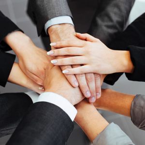 Business people joining hands