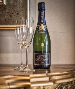 Champagne bottle and two wine flutes at an elegant function venue
